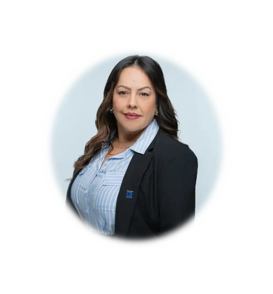 Nayeli in professional attire wearing a black blazer over a striped shirt